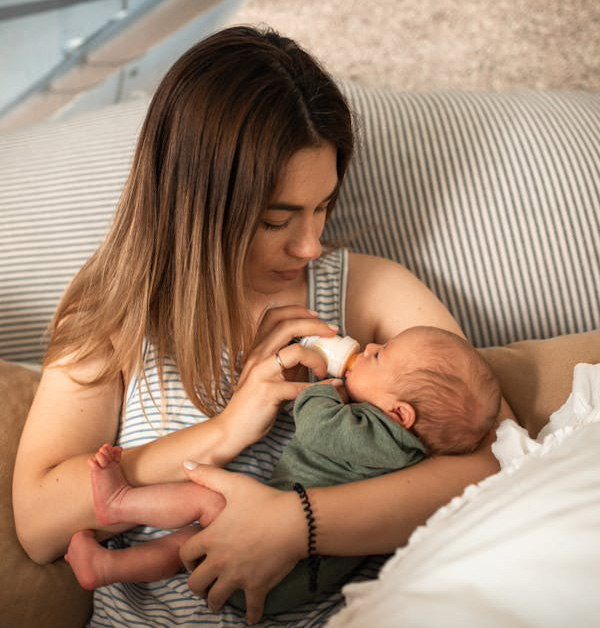 Mother feeding child